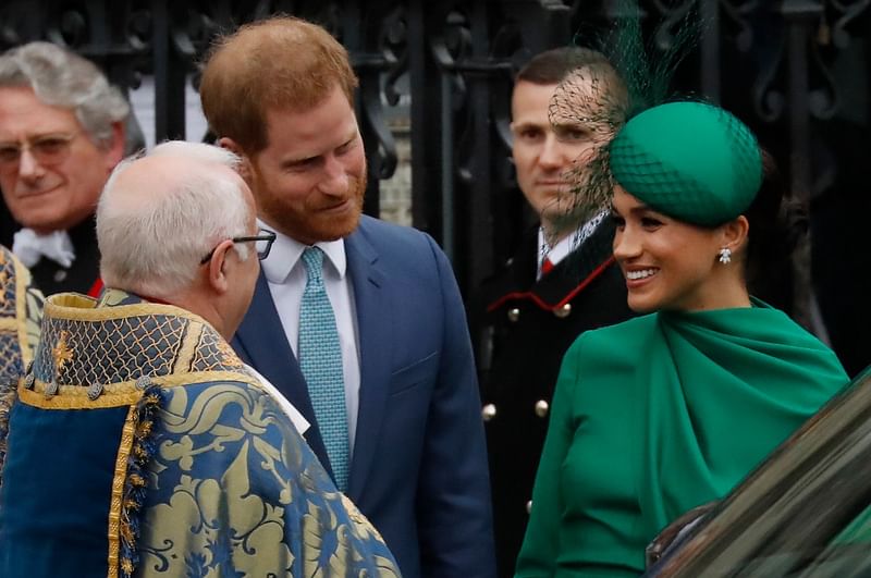 Britain's Prince Harry, Duke of Sussex (C) and Britain's Meghan, Duchess of Sussex (1st-R) leave after attending the annual Commonwealth Service at Westminster Abbey in London, 9 March 2020.