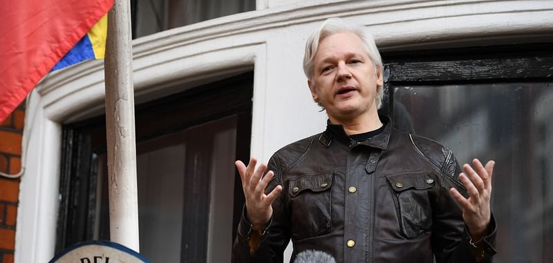 In this file photo taken on 19 May 2017 Wikileaks founder Julian Assange speaks on the balcony of the embassy of Ecuador in London.