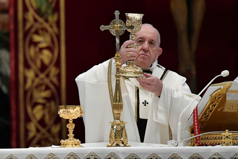 Pope Francis celebrates Easter Sunday Mass in St. Peter's Basilica with no public participation due to an outbreak of the coronavirus disease (COVID-19) on Easter Sunday at the Vatican on 12 April.