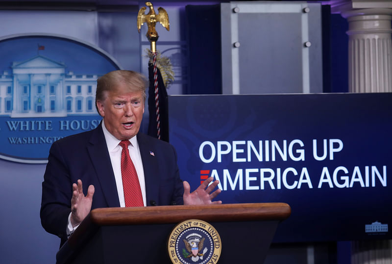 US president Donald Trump answers questions about his administration's plans for "Opening Up America Again" during the daily coronavirus task force briefing at the White House in Washington, US, on 16 April 2020.