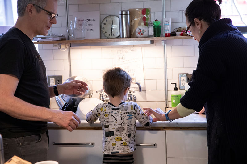 Naomi and Doug Hassebroek help their son Felix wash his hands during the outbreak of coronavirus disease (COVID-19) in the Brooklyn borough of, New York, US, on 11 April 2020