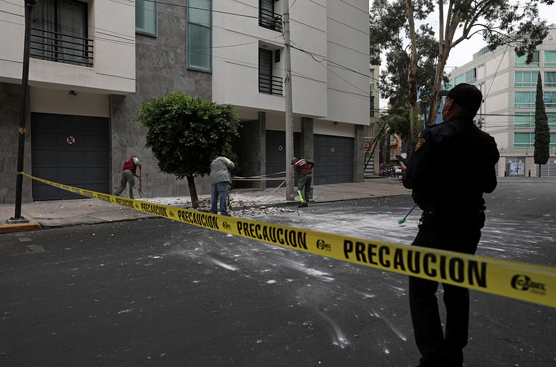 A powerful earthquake of magnitude 7.4 struck the coast of southern Mexico on Tuesday, killing at least one person, buckling paved roads, and setting off a tsunami in nearby Pacific coastal areas.