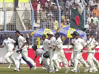 Bangladeshi cricketers celebrate after beating Kenya.