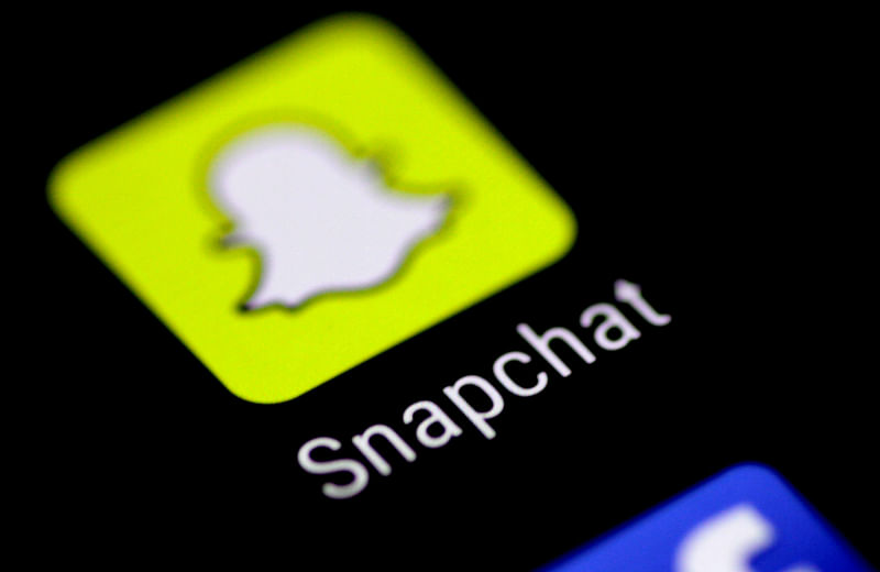 The Snapchat messaging application is seen on a phone screen 3 August 2017.