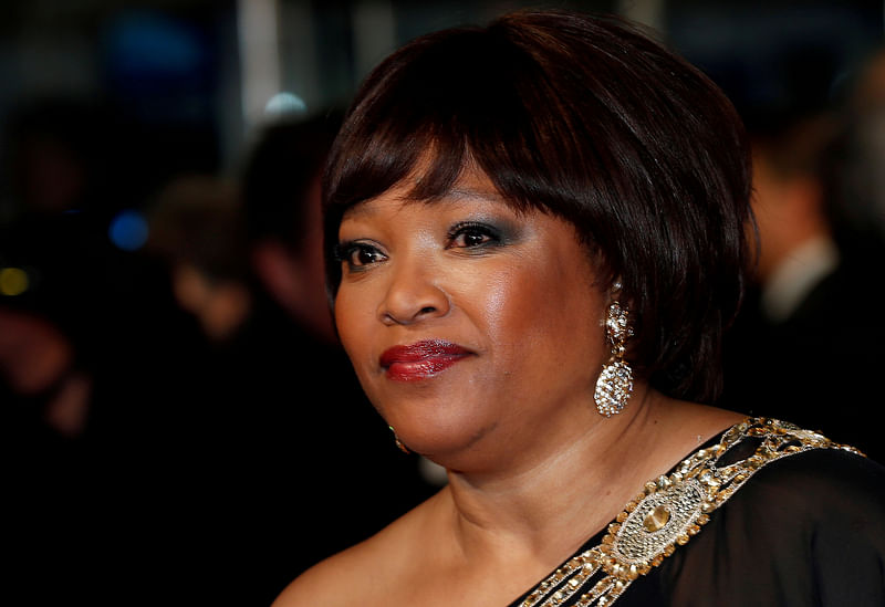 Zindzi Mandela, daughter of former South African president Nelson Mandela, arrives for the Royal premiere of "Mandela: Long Walk to Freedom" in London, 5 December 2013.