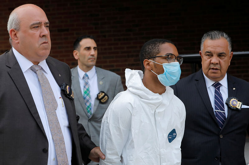 Tyrese Haspil, the suspect in the murder of Fahim Salehis is led by New York City Police Department (NYPD) officers