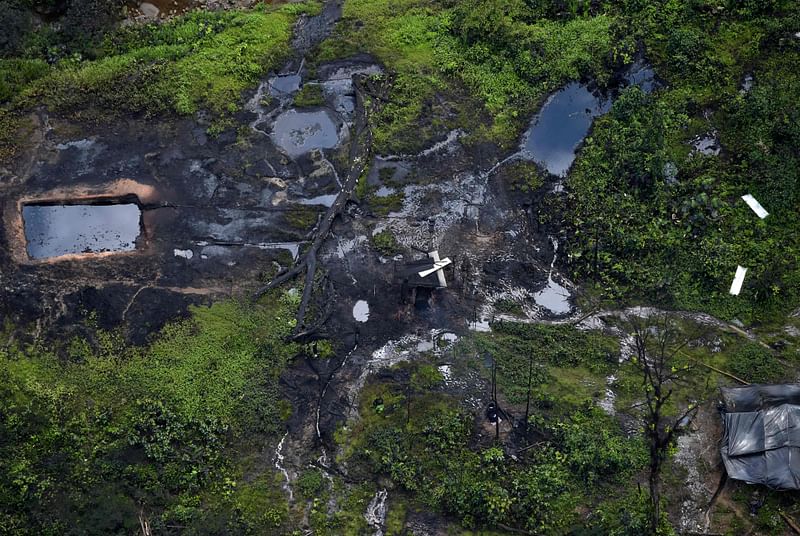 In this file photo taken on 26 February 2020, this aerial view shows the impact of illegal mining in Tumaco, Narino Department, Colombia, on 26 February 2020