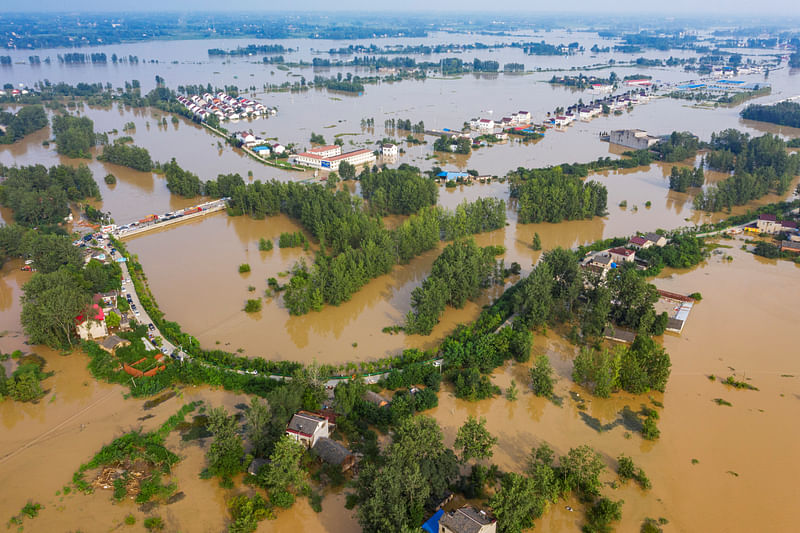 An aerial view shows the flooded Gu town following heavy rainfall in the region, in Luan, Anhui province, China 20 July.