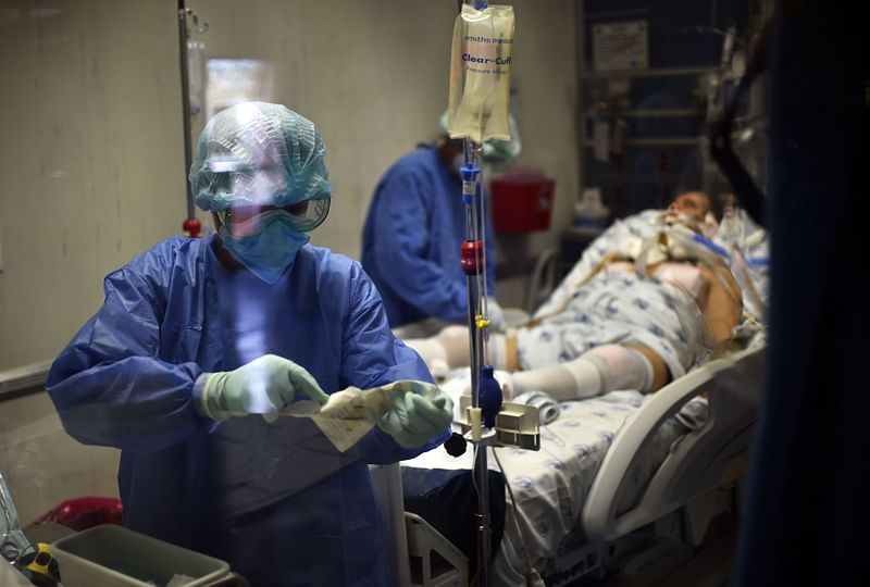 Doctors and nurses assist a COVID-19 patient at the Juarez de Mexico Hospital, in Mexico City, on 8 July 2020