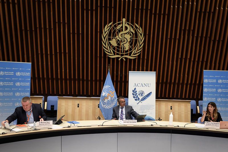 (From L) WHO health emergencies programme head Michael Ryan, WHO Director-General Tedros Adhanom Ghebreyesus and WHO technical lead head COVID-19 Maria Van Kerkhove attend a news conference organised by Geneva Association of United Nations Correspondents amid the COVID-19 outbreak, caused by the novel coronavirus, at the WHO headquarters in Geneva, Switzerland on 3 July 2020