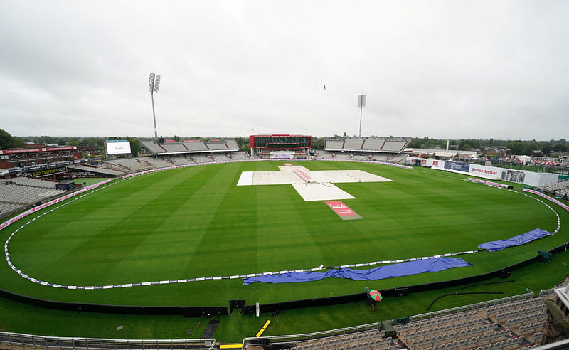 General view of rain covers before the start of play t Emirates Old Trafford, Manchester, Britain on 18 July, 2020