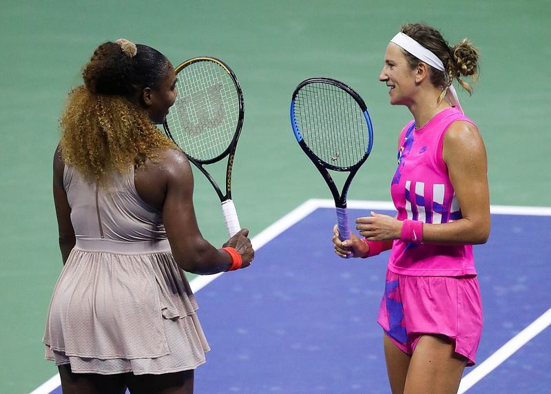 Victoria Azarenka (R) of Belarus talks with Serena Williams (L) of the US after winning the Women's Singles semifinal of the 2020 US Open at the USTA Billie Jean King National Tennis Center on 10 September 2020