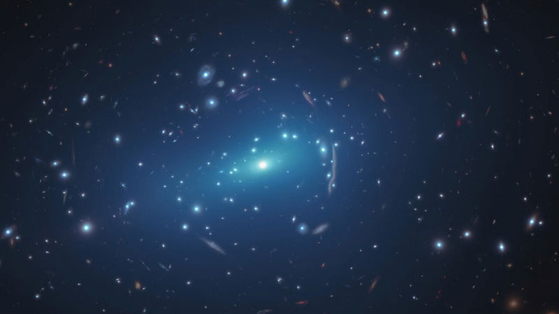 An undated NASA/ESA Hubble Space Telescope image shows the massive galaxy cluster MACSJ 1206.