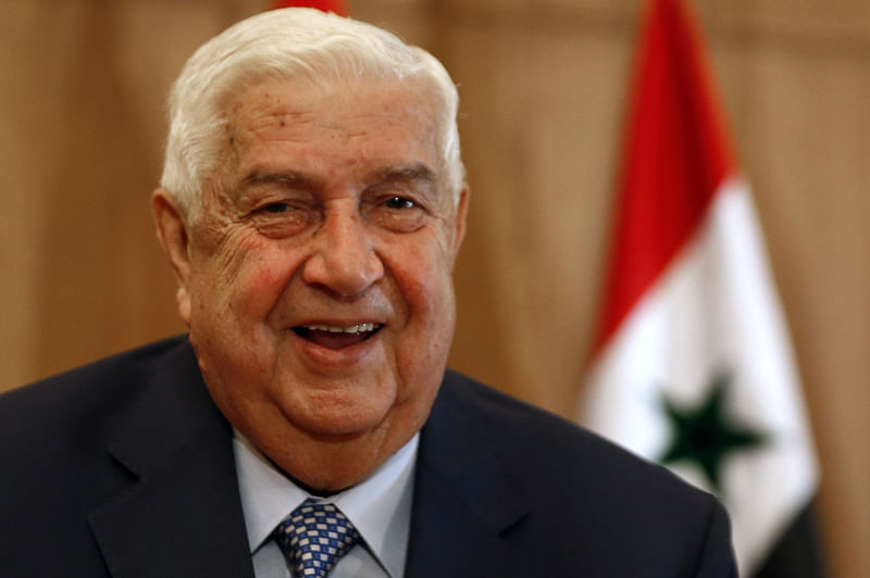 In this file photo taken on 23 June Syria's Foreign Minister Walid Muallem holds a press conference on new US sanctions imposed on the country, in the capital Damascus.