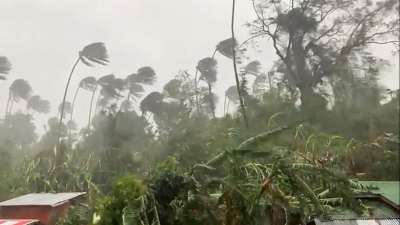 Heavy rain in a forested area, wind blowing trees in Mindoro Oriental, Philippines October 26, 2020 in this still image obtained from video