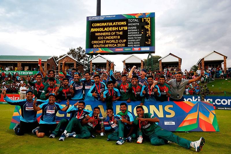 The Bangladesh cricket cricketers pose for a group photograph after winning the ICC Under-19 World Cup cricket finals between India and Bangladesh at the Senwes Park, in Potchefstroom, on 9 February 2020