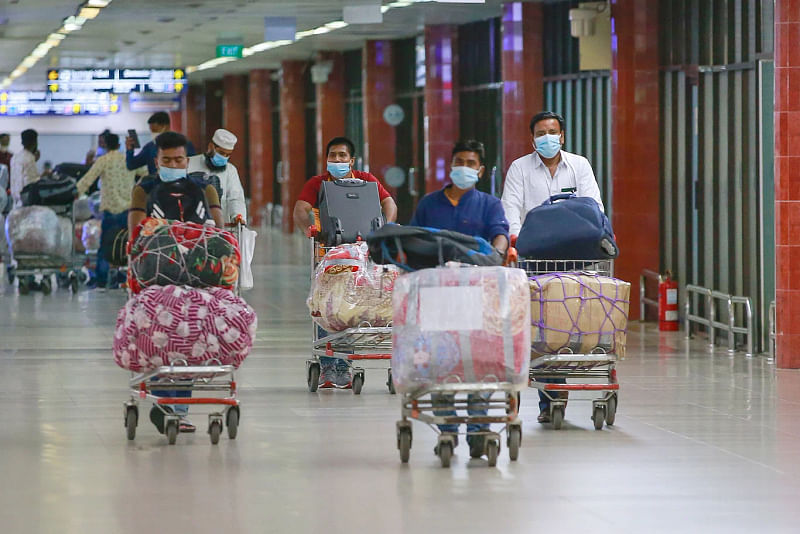 Migrant workers arrive at the Hazrat Shah Jalal International Airport