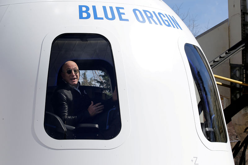 Amazon and Blue Origin founder Jeff Bezos addresses the media about the New Shepard rocket booster and Crew Capsule mockup at the 33rd Space Symposium in Colorado Springs, Colorado, United States 5 April, 2017