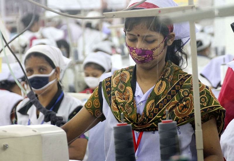 Female workers work at a clothing factory in Chattogram.