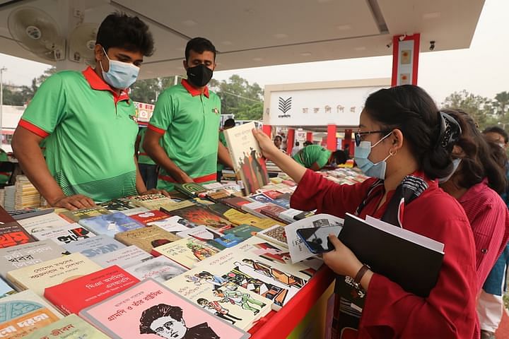 Visitors at Amar Ekushey Book Fair at the portion of Suhrawardy Udyan