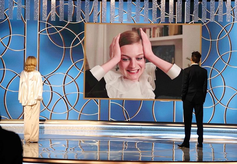 This handout photo courtesy of NBCUniversal shows Emma Corrin (on screen) accepting the Best Television Actress – Drama Series award for "The Crown" via video from Kyra Sedgwick and Kevin Bacon at the 78th Annual Golden Globe Awards held at the Beverly Hilton Hotel on 28 February