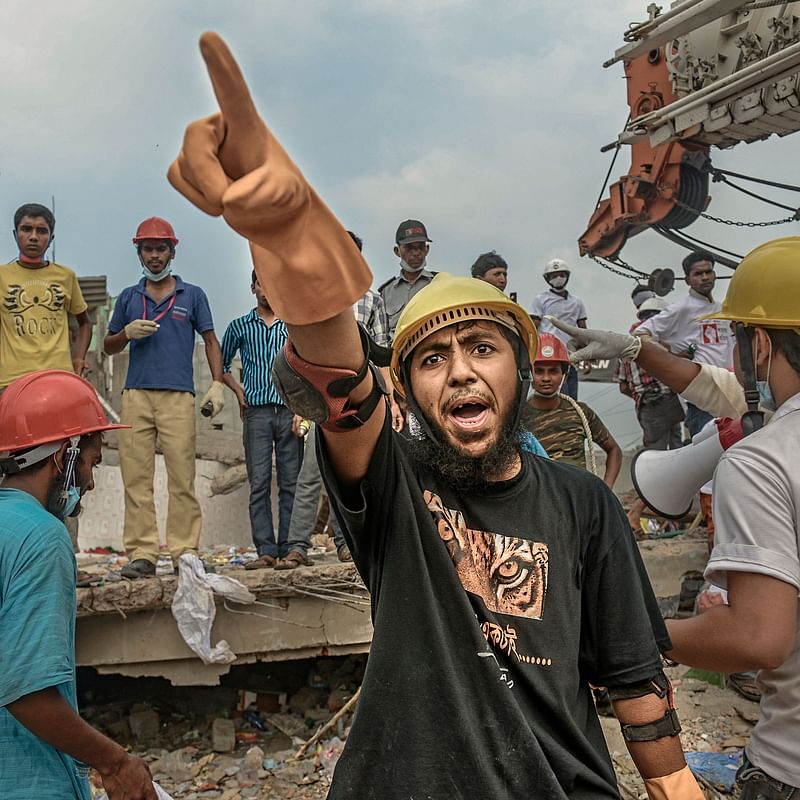 A volunteer rescuer, Mohammad Mobarak Hossain, during the rescue operation at Rana Plaza. 
28 April 2013