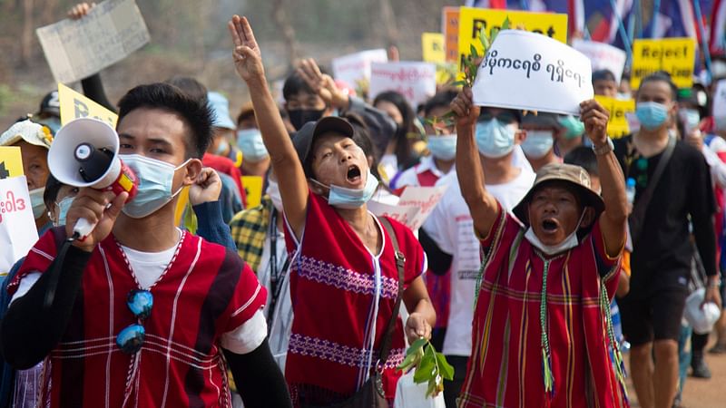 This handout from the Karen Information Center taken and released to AFP on 31 March 2021 shows ethnic Karen people taking part in an anti-military coup demonstration in Hlaingbwe township, in eastern Myanmar's Karen state