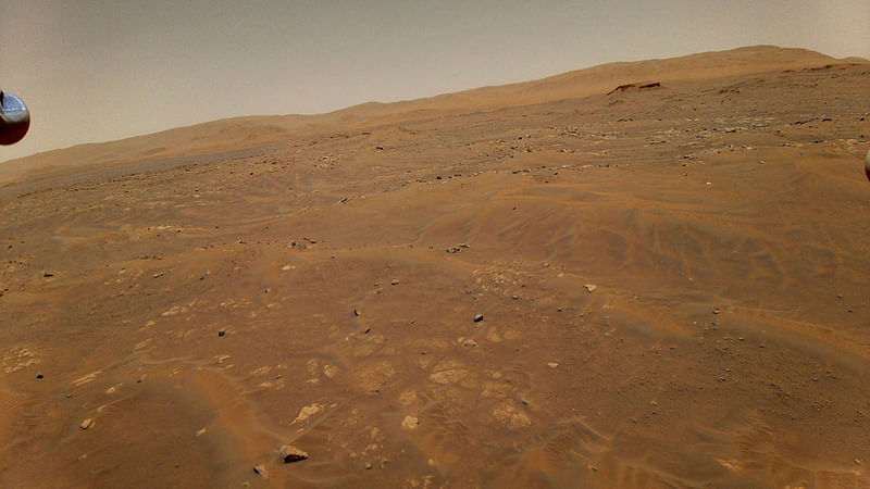 This image of Mars was taken from the height of 33 feet (10 metres) by NASA’s Ingenuity Mars helicopter during its sixth flight on 22 May 2021