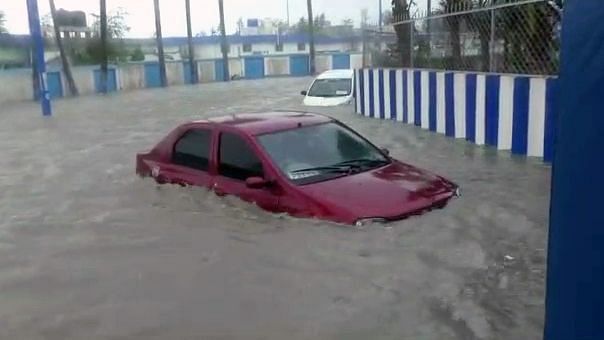 Vehicles submerged due to heavy rainfall due to Cyclone Yaas landfall, on 26 May 2021