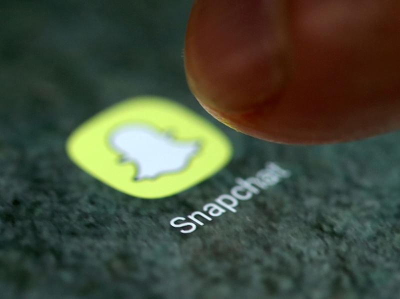 The Snapchat app logo is seen on a smartphone in this picture illustration taken on 15 September 2017