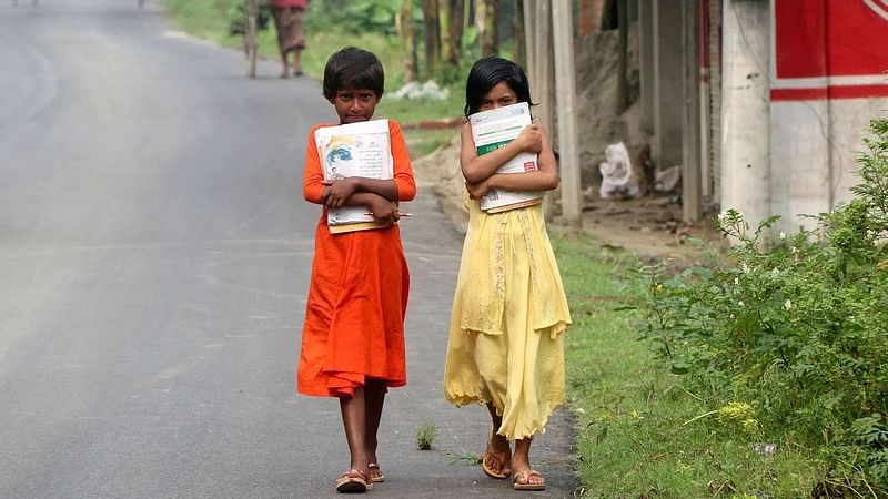 Two children on their way to school