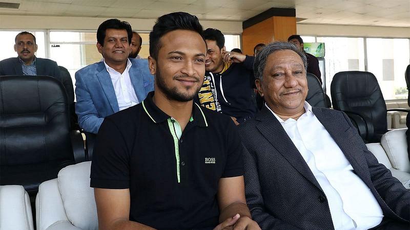 Ace all-rounder Shakib Al Hasan (L) with BCB president Nazmul Hassan