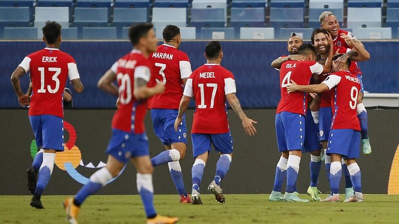 Chile’s Ben Brereton celebrates scoring their first goal with teammates in Copa America 2021 Group A match against Bolivia at Arena Pantanal, Cuiaba, Brazil on 18 June 2021