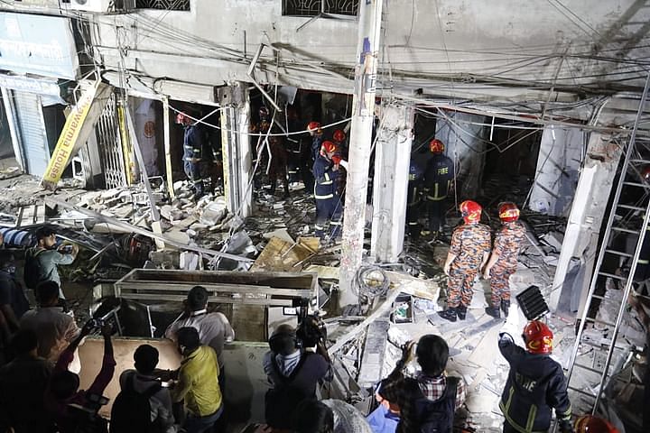 Fire fighters conducts rescue operation after the blast in Moghbazar on 27 June.