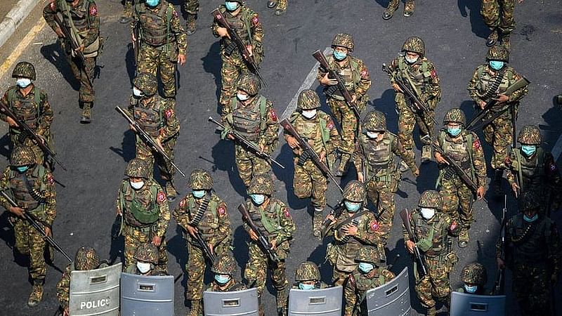 Myanmar army in action during a public protest in Yangon