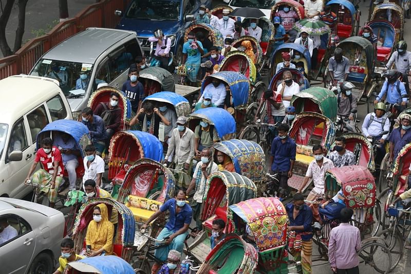 Amid the restrictions, the presence of rickshaws has increased on different streets of Dhaka city. The picture was taken on 6 July 2021.