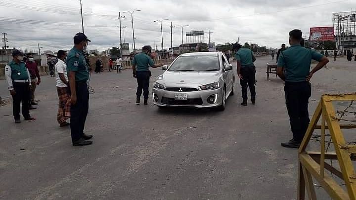 Law enforcement active on the first day of strict restrictions. Siddhirganj Signboard area, Narayanganj, 23 July 2021.