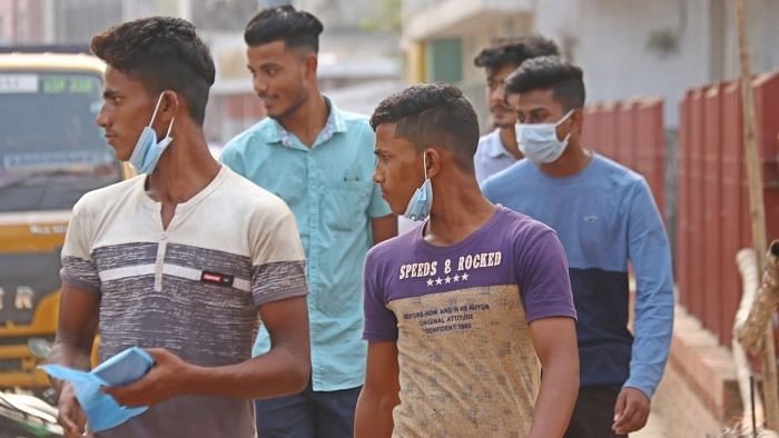 People are lax of wearing face masks although Covid-19 cases are increasing in Bangladesh. This picture was taken near Shaheed Minar area in Sylhet on 23 November 2020