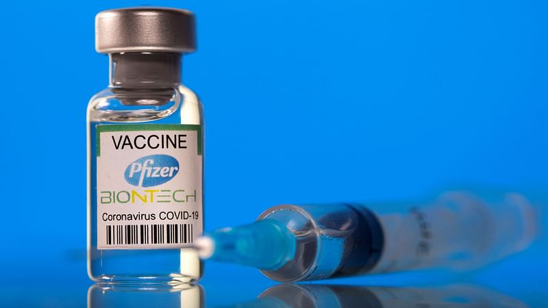 A vial labelled with the Pfizer-BioNTech coronavirus disease (Covid-19) vaccine is seen in this illustration picture taken on 19 March 2021