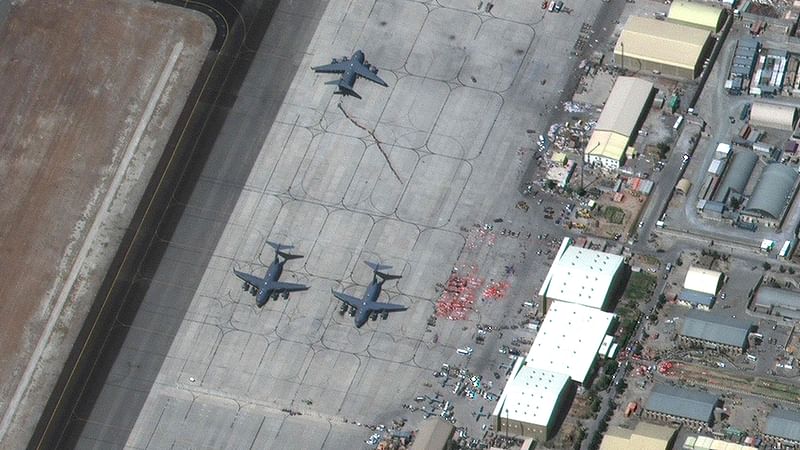 This 27 August 2021, satellite image courtesy of MAXAR, military aircraft at Hamid Karzai International Airport in Kabul. Last-ditch evacuation flights took off from Kabul airport on Friday, a day after twin suicide bombings on crowds trying to flee Taliban-controlled Afghanistan