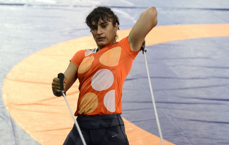 In this file photo taken on 24 May 2016 Indian wrestler Vinesh Phogat takes part in a practice session at a Sports Authority of India (SAI) gymnasium in Lucknow