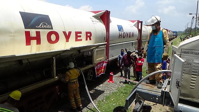 Oxygen being unloaded at the West Railway Station of Bangabandhu Bridge, Sirajganj. Friday morning.