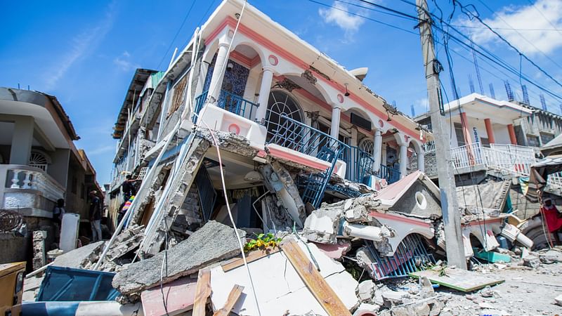 A view shows houses destroyed following a 7.2 magnitude earthquake in Les Cayes, Haiti on 14 August 2021