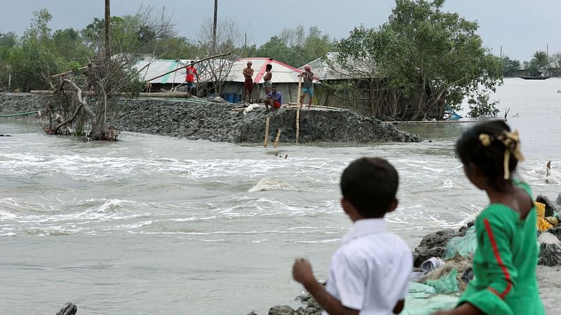 Coastal area is seen flooded after the embankment is destroyed as the cyclone Amphan makes its landfall in Satkhira, Bangladesh, on 21 May 2020