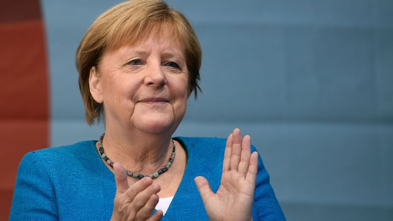 German chancellor Angela Merkel applauds during a campaign rally for Christian Democratic Union CDU leader and chancellor candidate Armin Laschet (not pictured) in Aachen, western Germany, on 25
 September, 2021