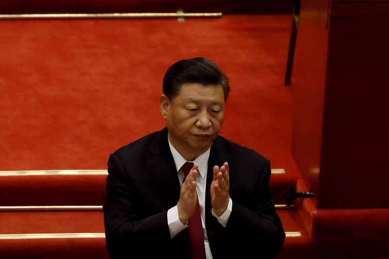 Chinese president Xi Jinping applauds at the opening session of the National People's Congress (NPC) at the Great Hall of the People in Beijing, China on 5 March 2021.