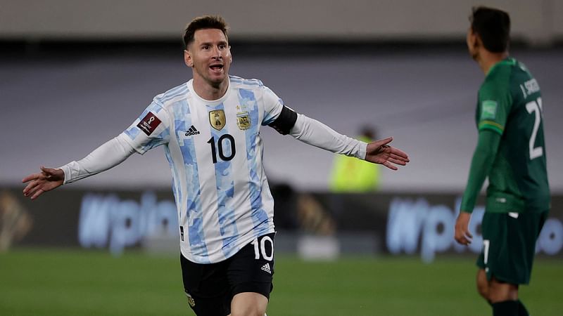 Argentina's Lionel Messi celebrates after scoring against Bolivia during the South American qualification football match for the FIFA World Cup Qatar 2022 at the Monumental Stadium in Buenos Aires on 9 September 2021