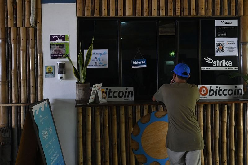 A man pays using bitcoins at a hotel in El Zonte, La Libertad, El Salvador on 4 September, 2021