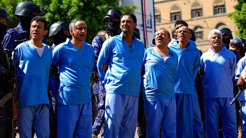 Defendants are lined up before being executed after being convicted for involvement in the assassination of Huthi political leader Saleh al-Sammad three years ago, at a public square in the Yemeni capital Sanaa, on 18 September, 2021