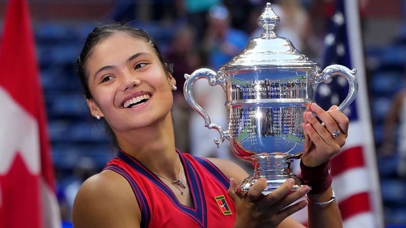 Britain's Emma Raducanu celebrates with the trophy after winning the 2021 US Open Tennis tournament women's singles final match against Canada's Leylah Fernandez at the USTA Billie Jean King National Tennis Center in New York, on 11 September, 2021